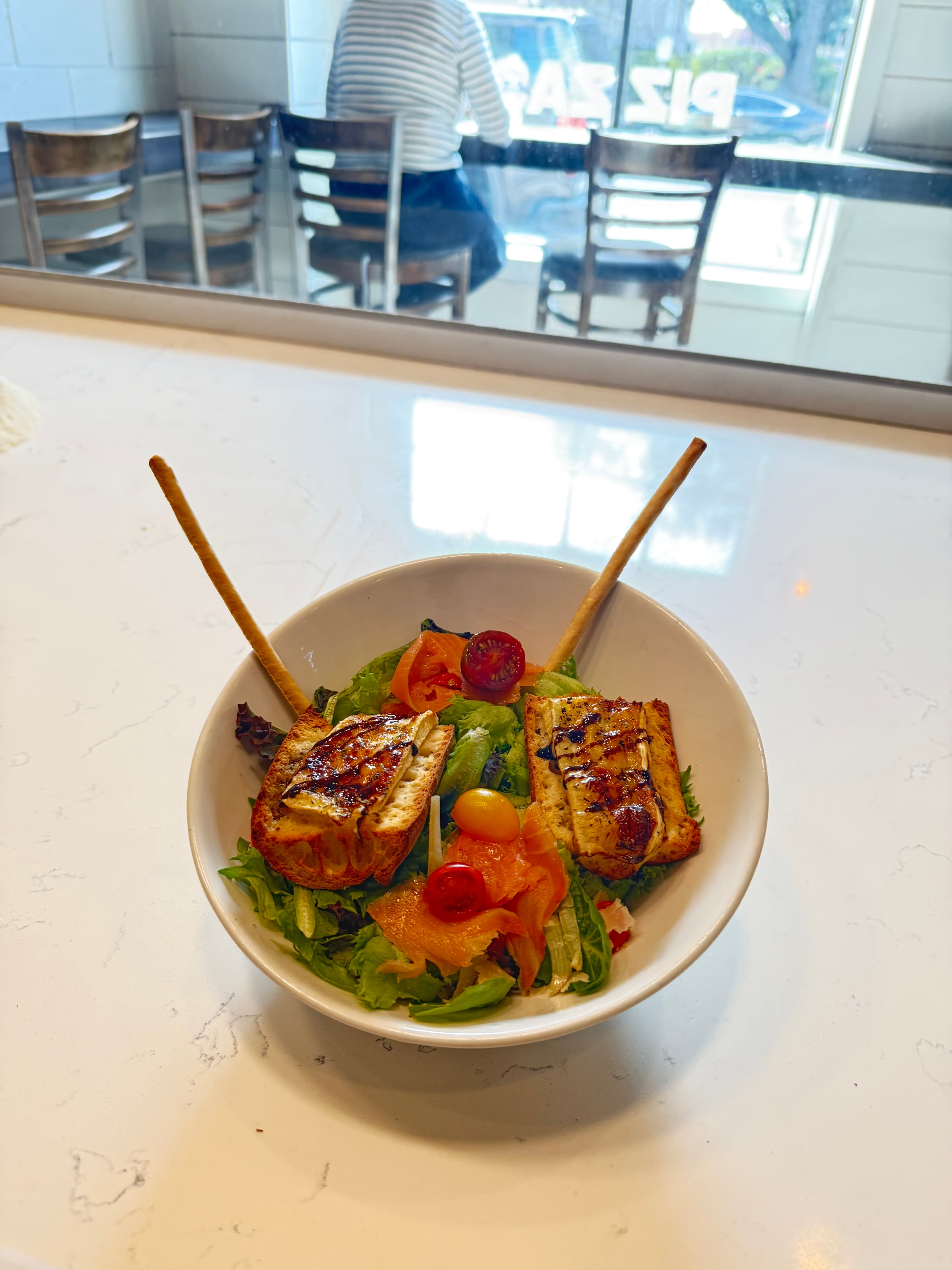 Paulette Café interior with friendly staff and French decor