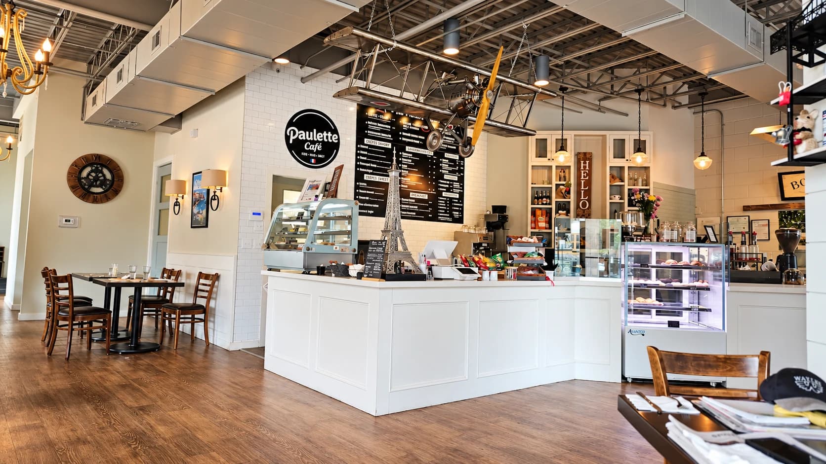 The dining room and pastry counter at Paulette Conroe